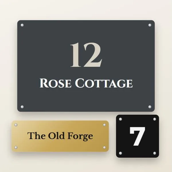 Three personalised house signs: a grey number plaque, a brushed brass name plate and a black door number