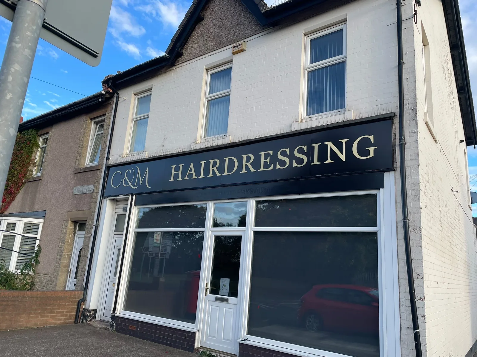 Shop fascia for C & M Hairdressing