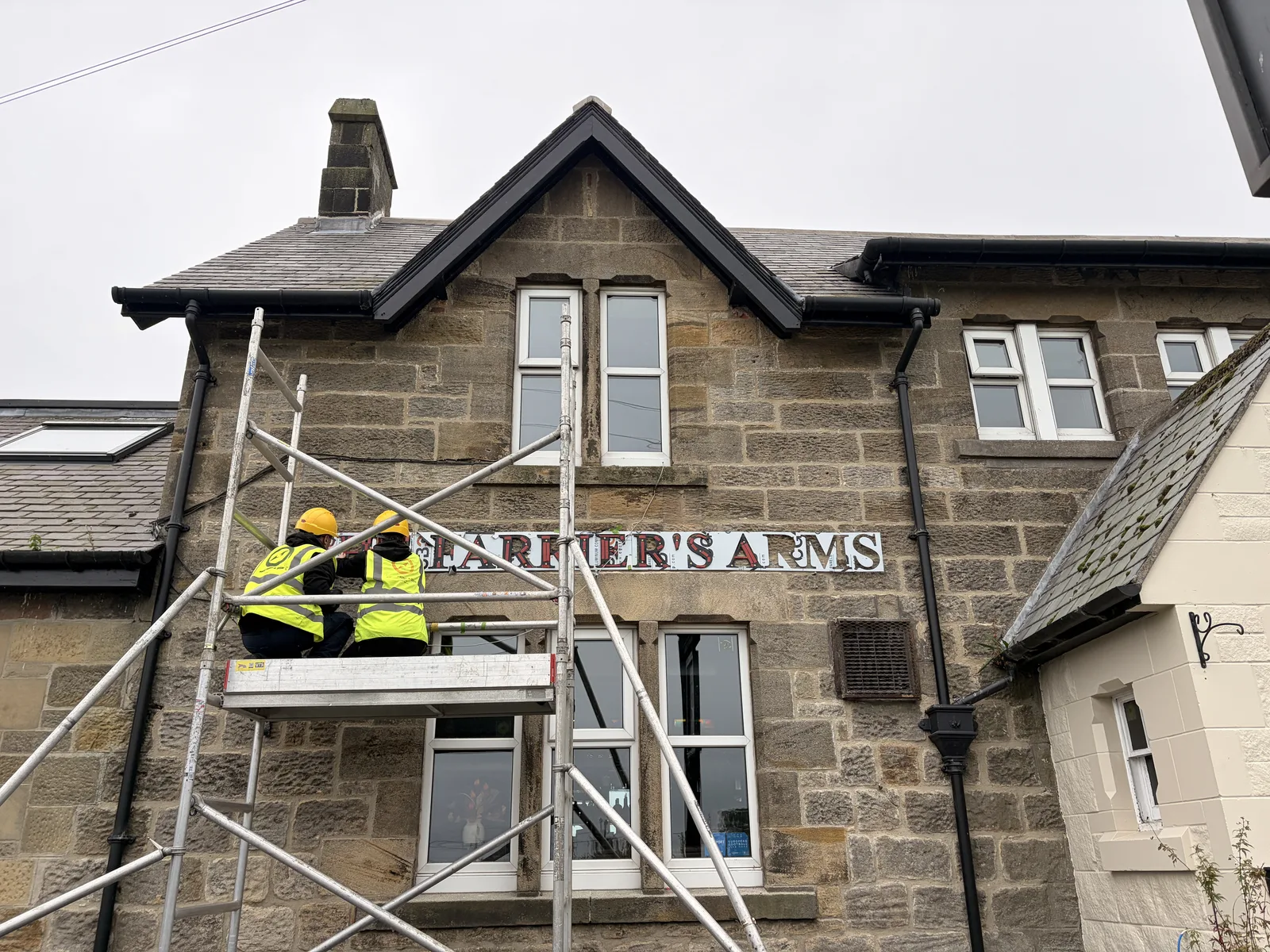 Gold built-up letters on stone for Farrier's Arms