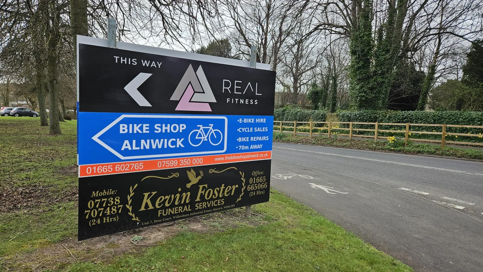 Directional post signs for Real Fitness