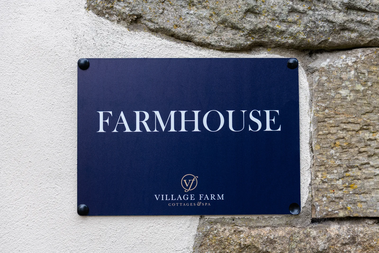 Slate house sign for Village Farm cottages